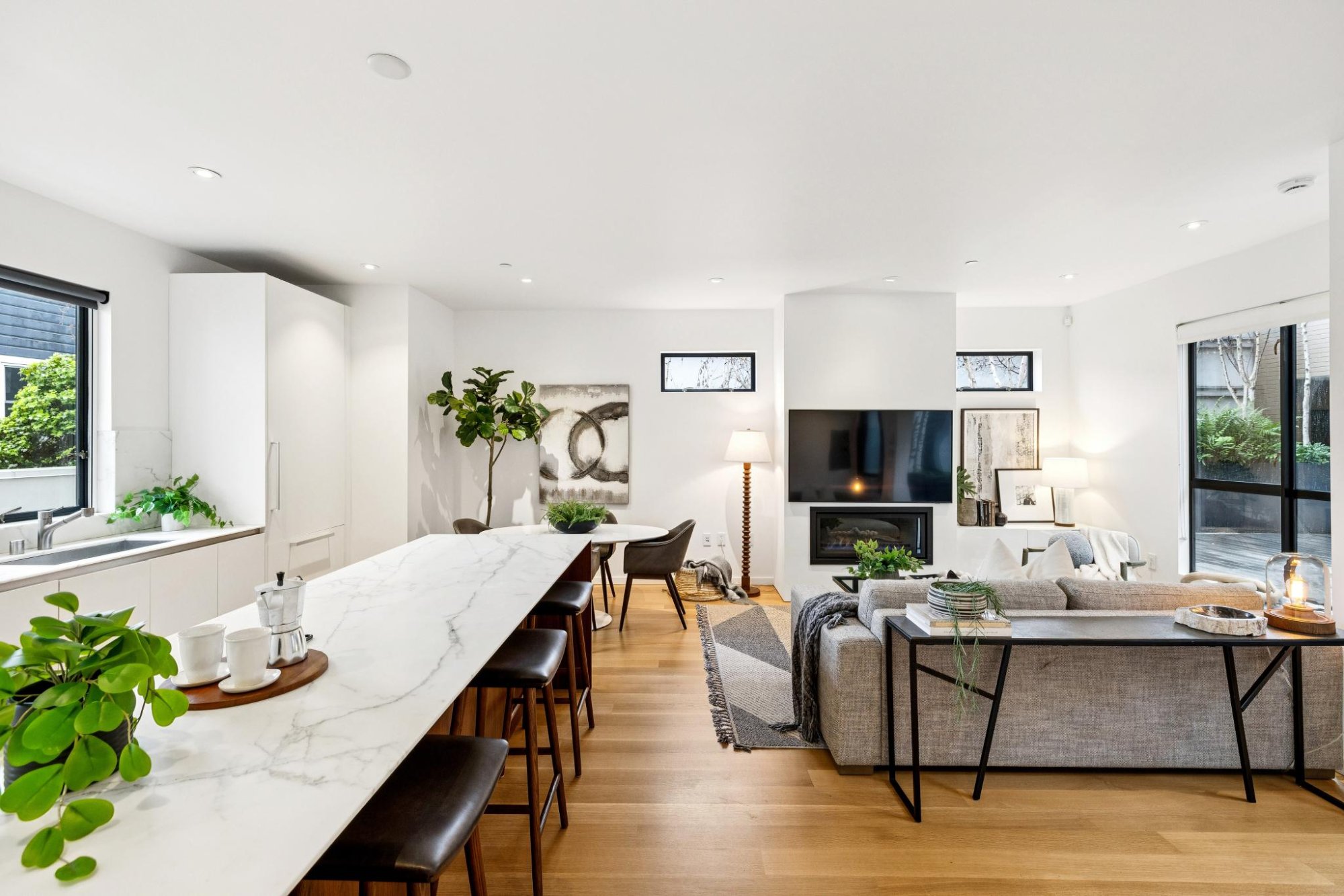 Open living, dining, and kitchen at Residence 209